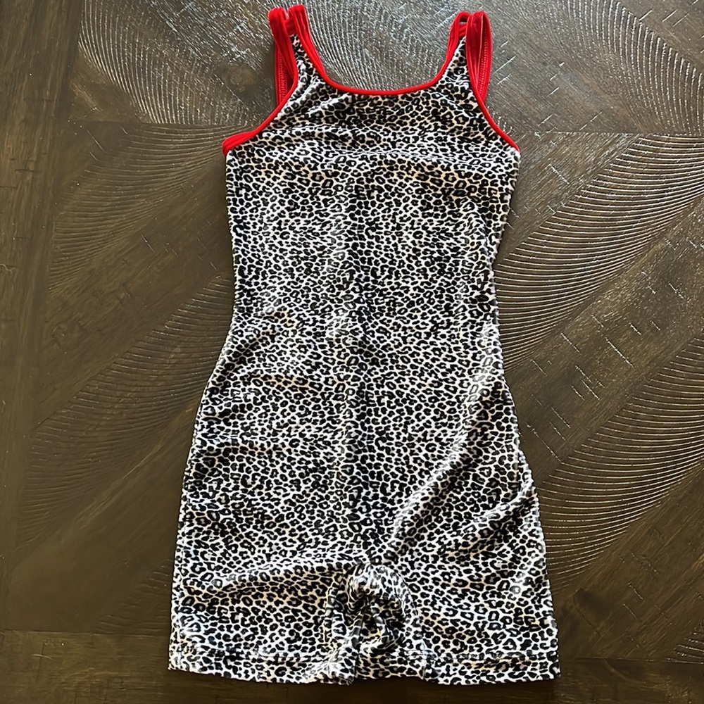 GK Elite leotard. Child’s Medium. Grey leopard and red.